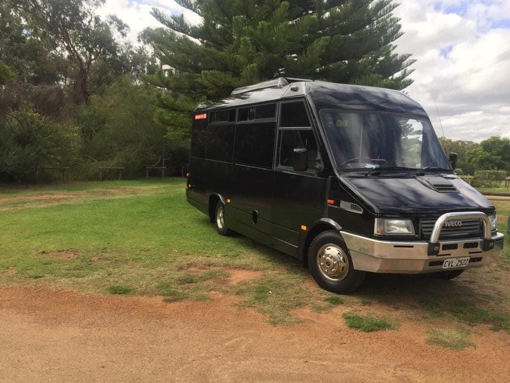 Side view of the 21 seater party bus